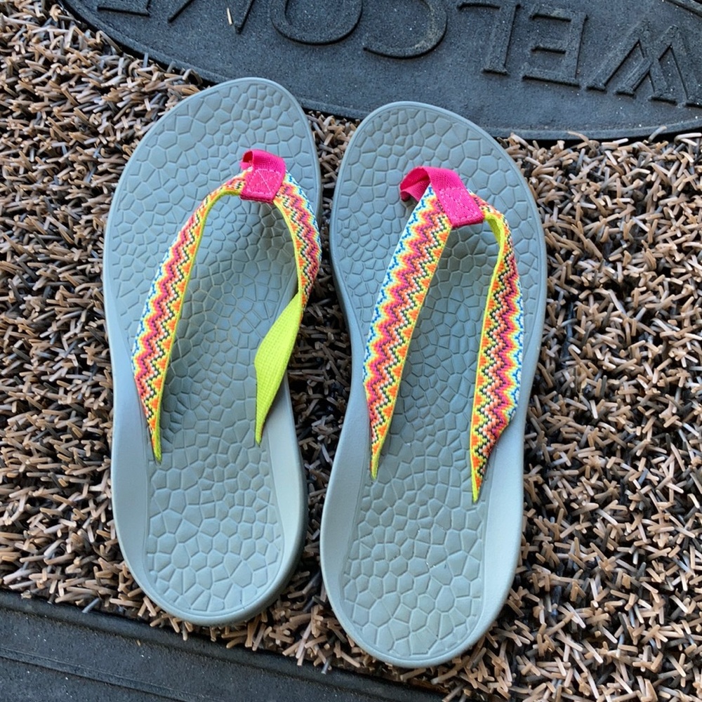 Pink Chaco flip flops